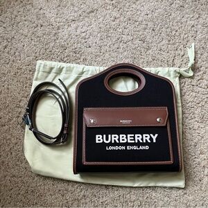 Brand New Burberry mini pocket bag in black/tan